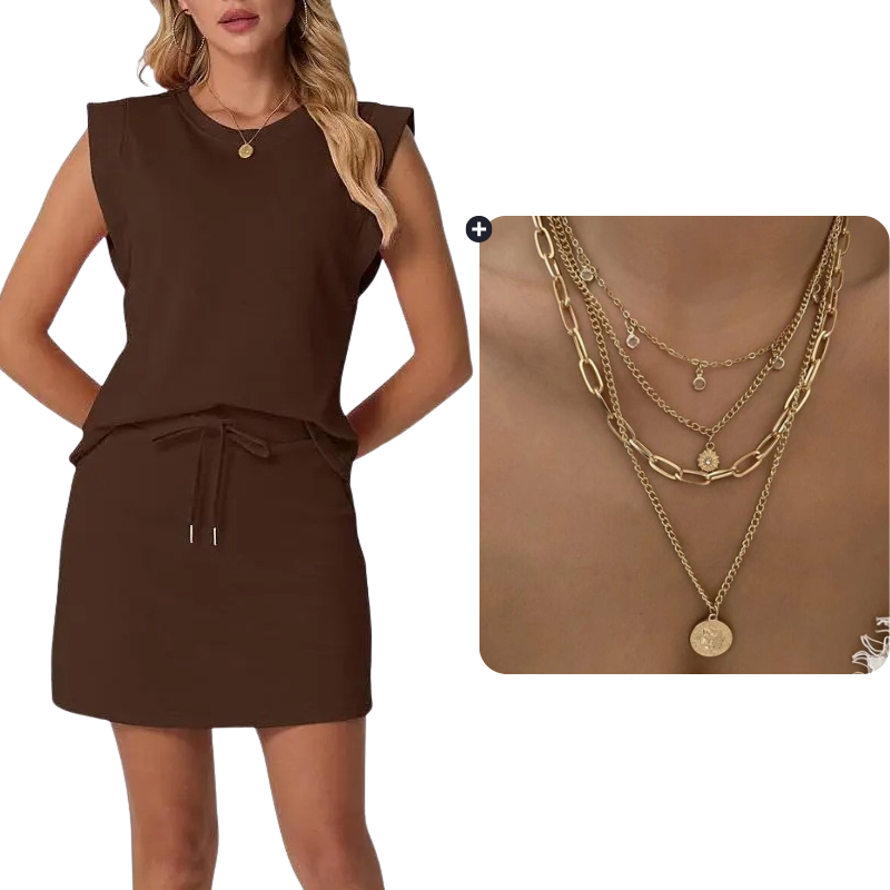 Set bestaande uit een moderne mouwloze top en een rok met trekkoord