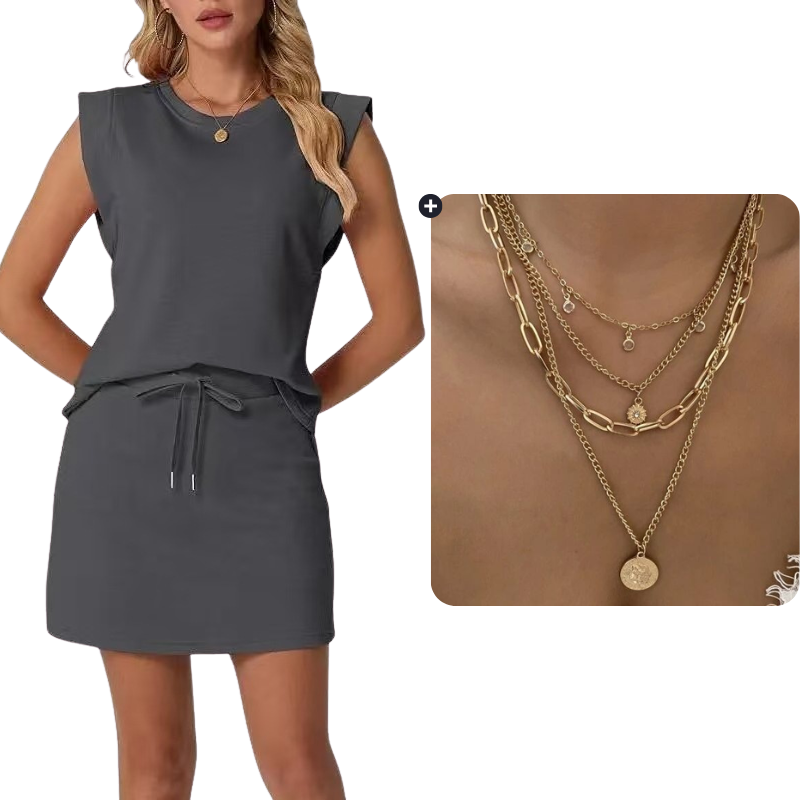 Set bestaande uit een moderne mouwloze top en een rok met trekkoord